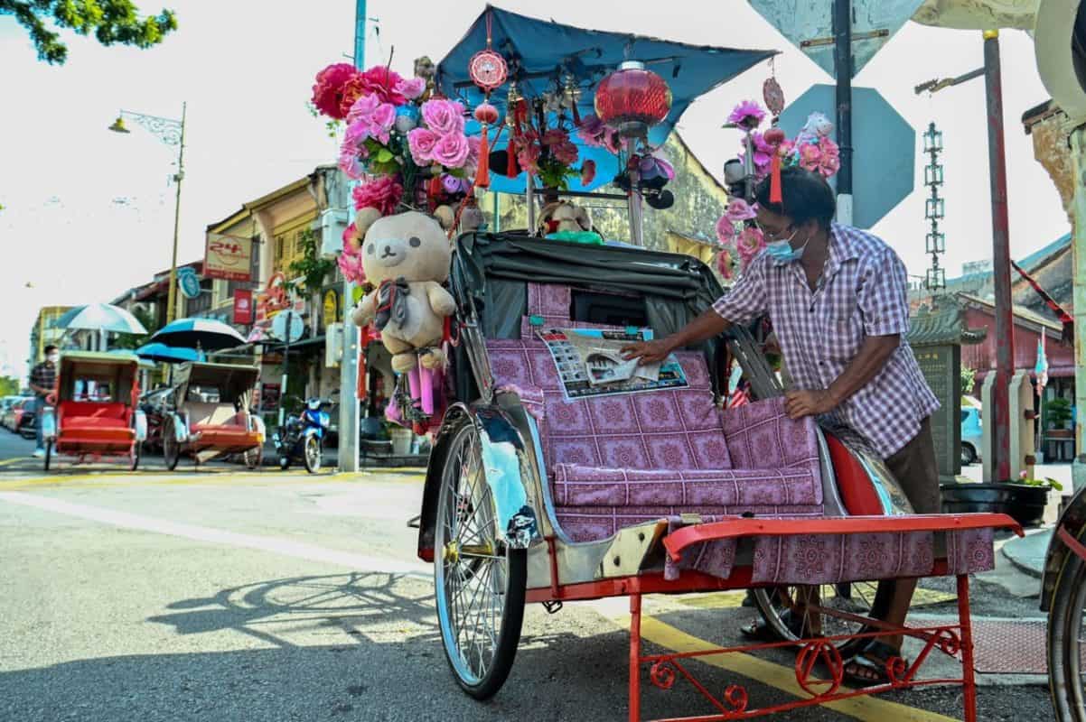 Trishaw riders in Penang keeping their fingers crossed | Buletin Mutiara