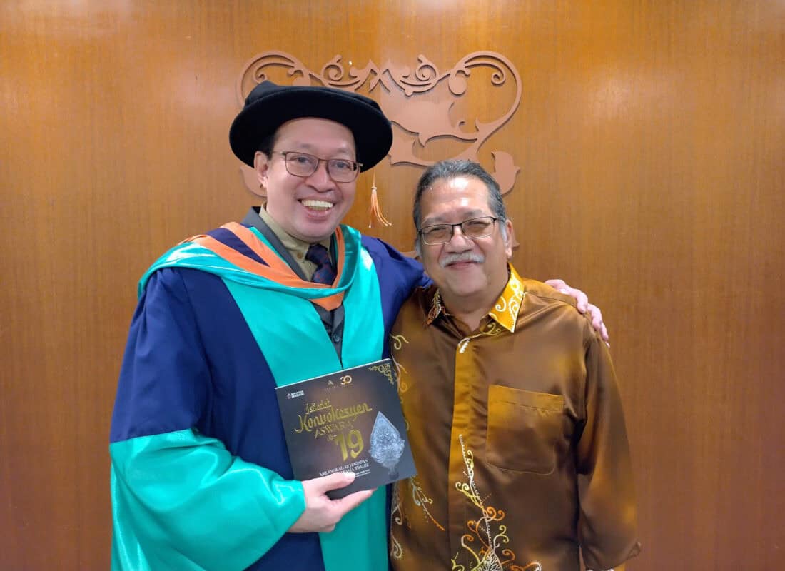 two sons of penang paul and aswara dean of music dr. james boyle at the convocation